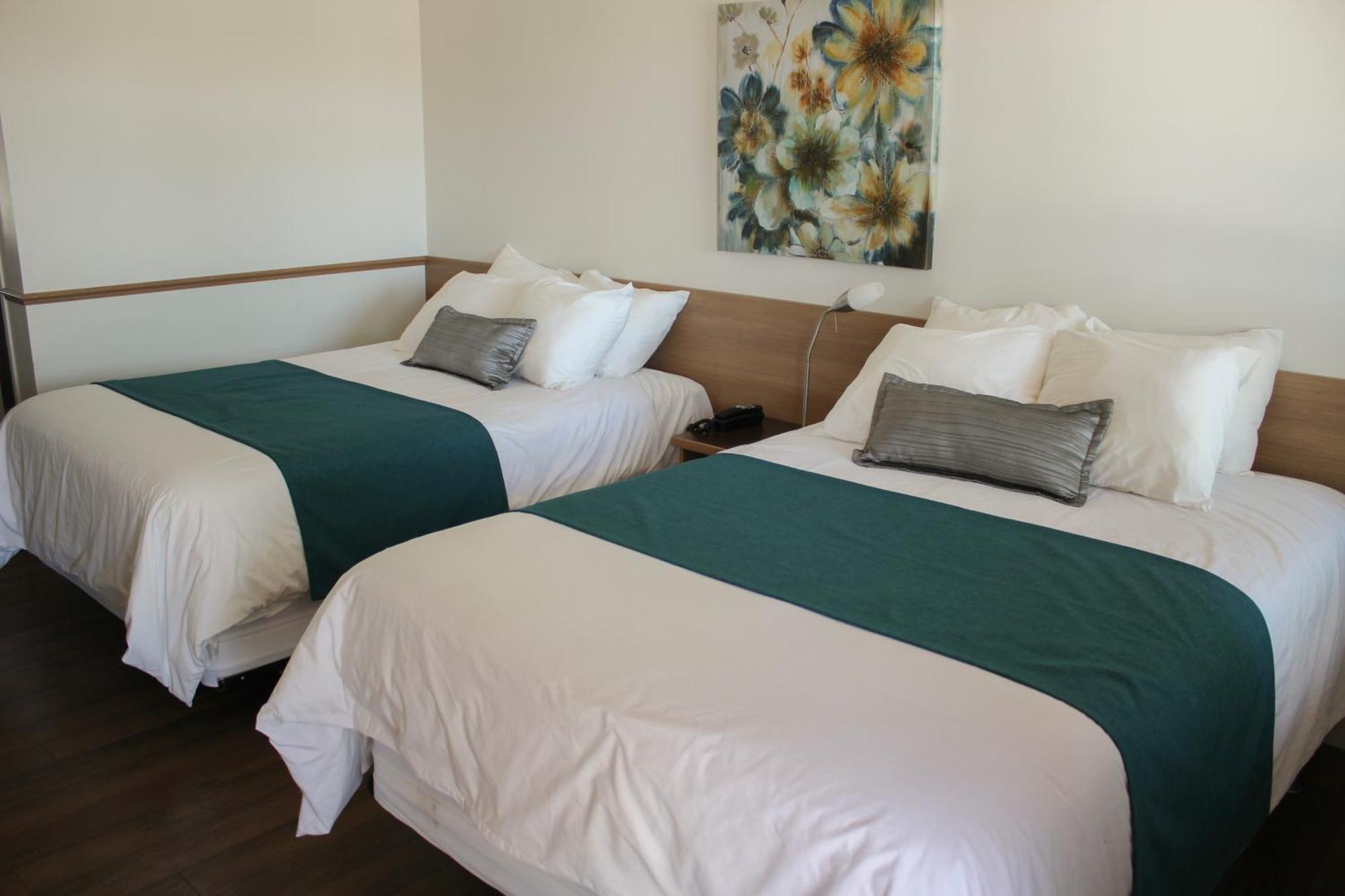 Auberge Le Parasol Saguenay Bagian luar foto
