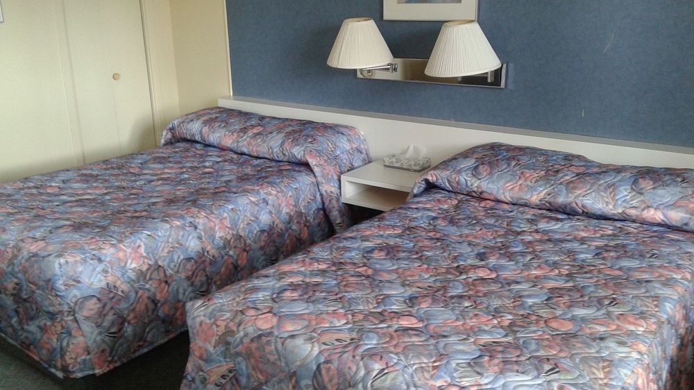 Auberge Le Parasol Saguenay Bagian luar foto