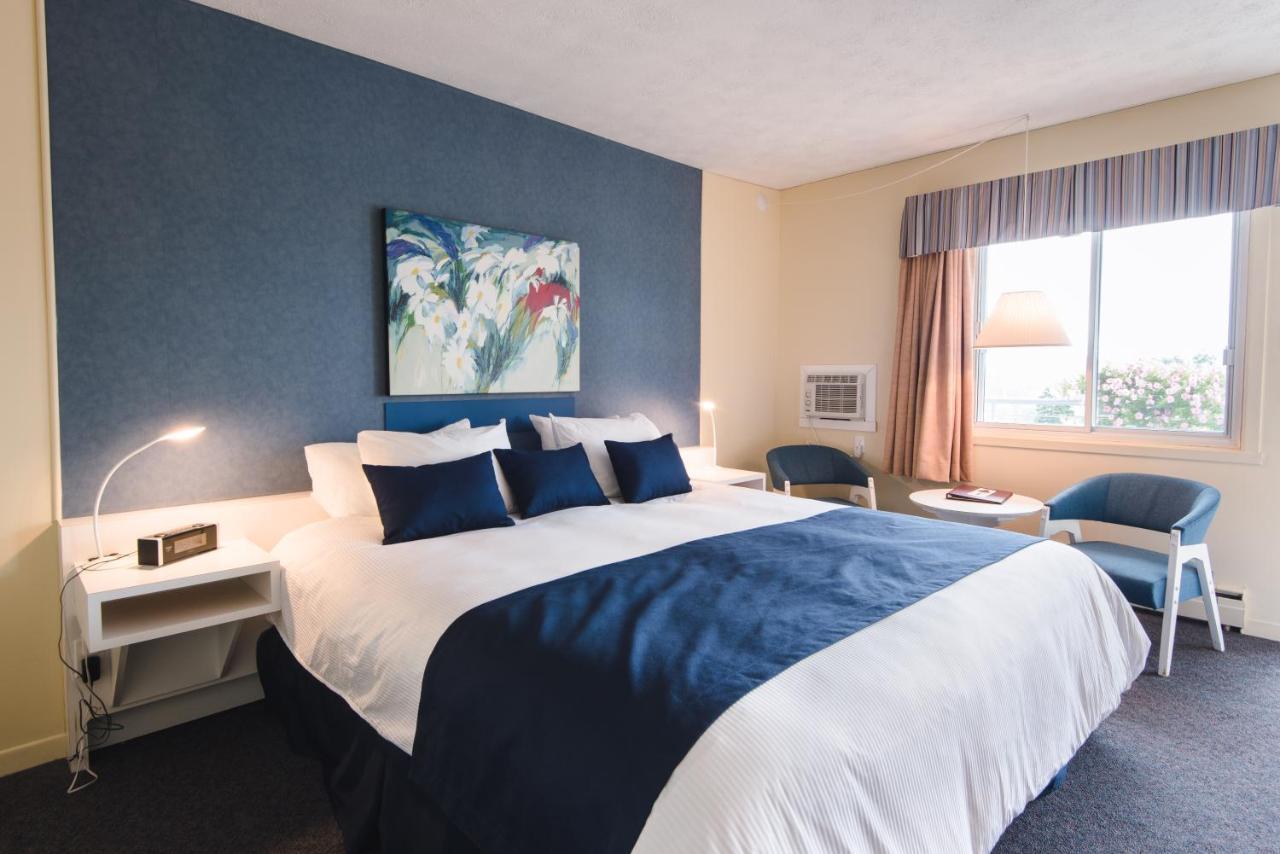 Auberge Le Parasol Saguenay Bagian luar foto